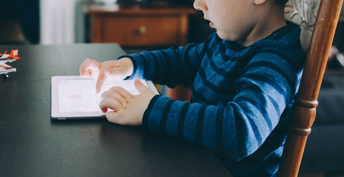 child with tablet